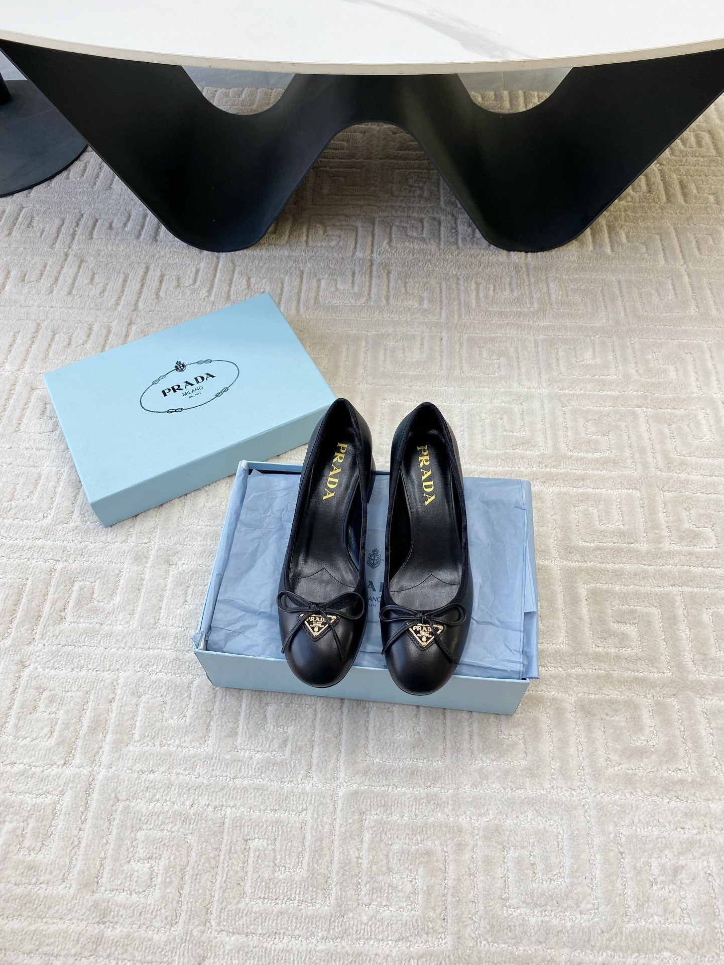 BALLERINA PUMPS WITH TRIANGLE LOGO AND BOW IN BLACK CALFSKIN - 35