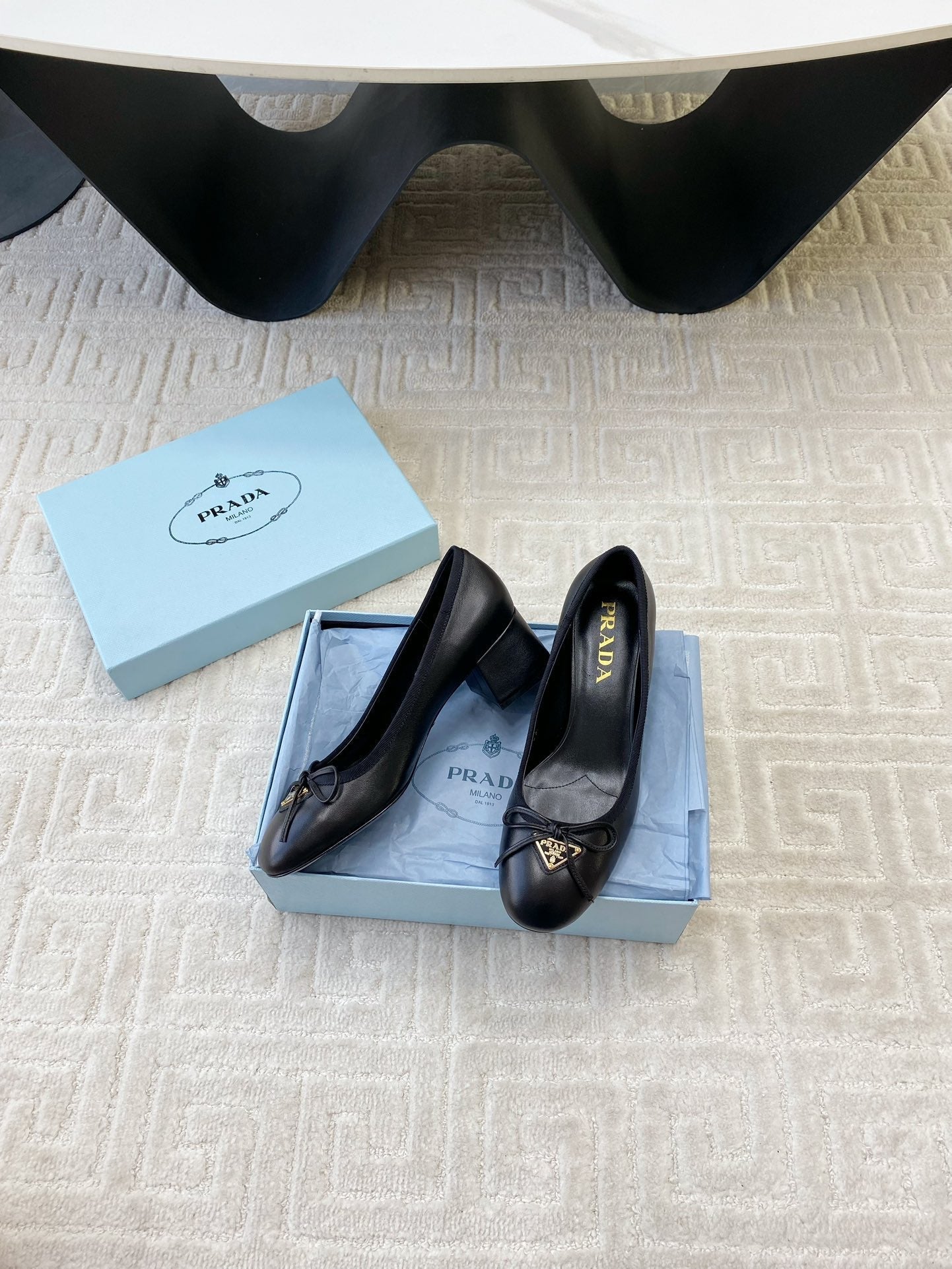 BALLERINA PUMPS WITH TRIANGLE LOGO AND BOW IN BLACK CALFSKIN - 35