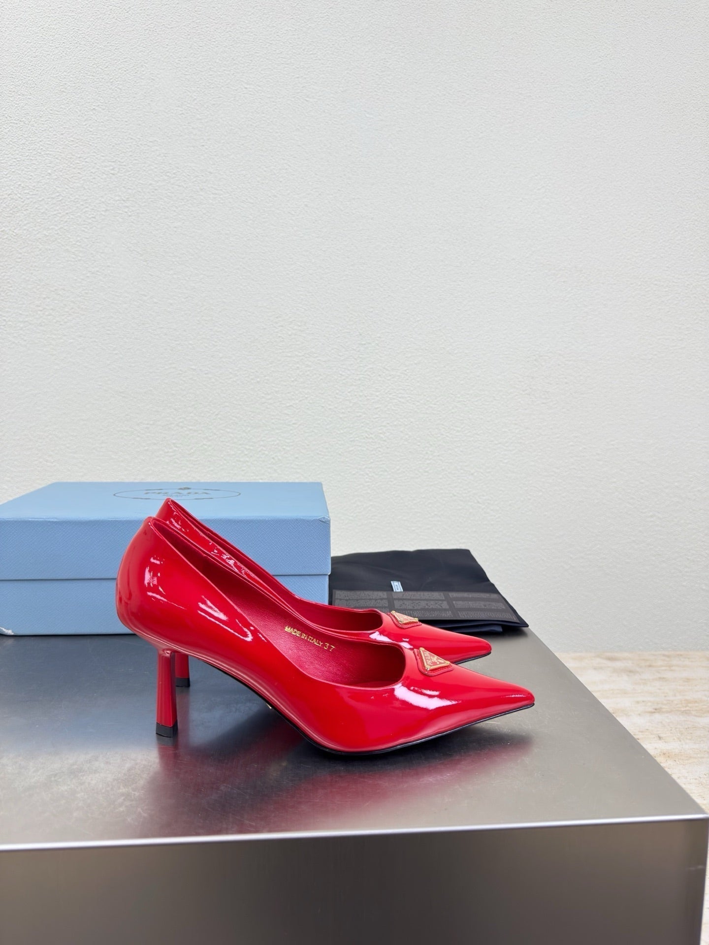 PRADA 26S POINTED TOE PUMPS 75MM IN RED PATENT CALFSKIN