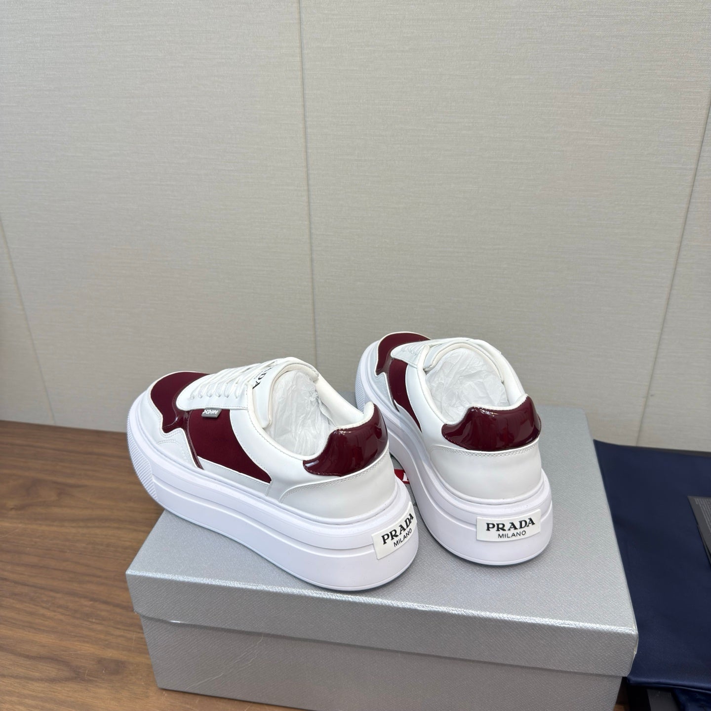 PRADA 25S DOWNTOWN BOLD SNEAKERS 45MM IN WHITE AND BURGUNDY CALFSKIN - 35
