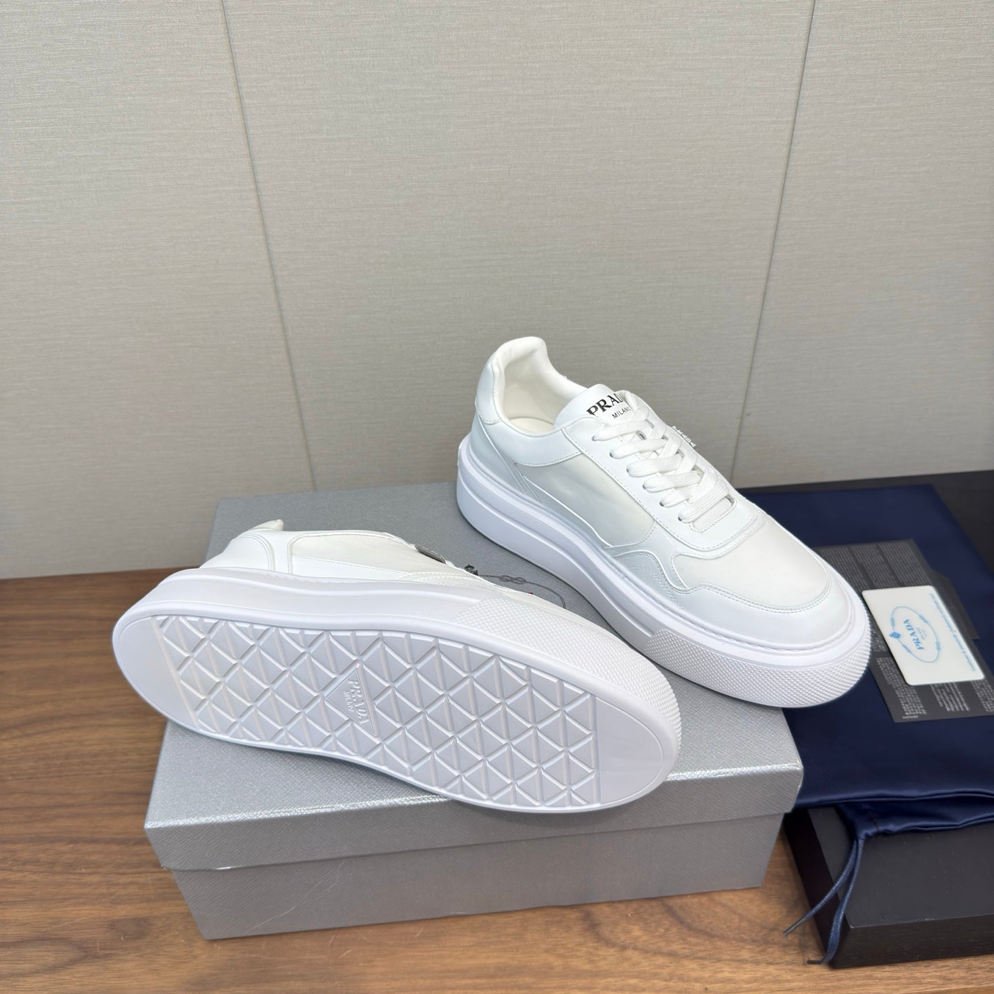 PRADA 25S DOWNTOWN BOLD SNEAKERS 45MM IN WHITE CALFSKIN - 35