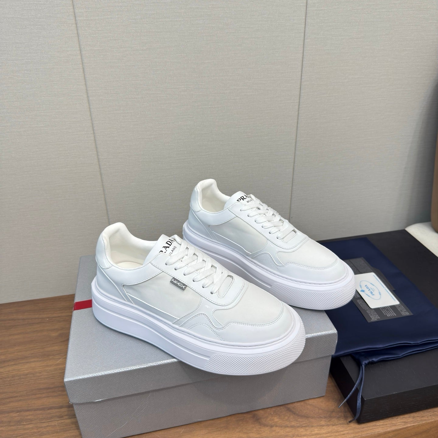 PRADA 25S DOWNTOWN BOLD SNEAKERS 45MM IN WHITE CALFSKIN - 35