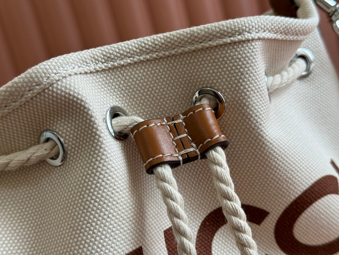 SMALL DRAWSTRING SHOULDER BAG 21 IN WHITE CANVAS BROWN CALFSKIN