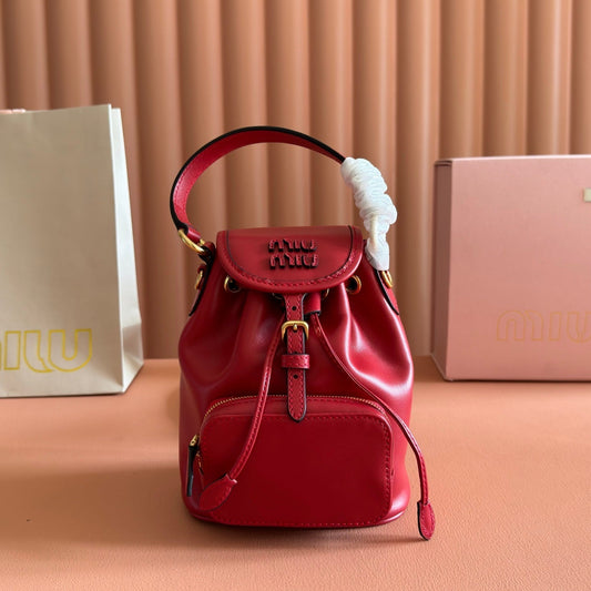 РЮКЗАК MIUMIU 26S MINI-BACKPACK 17 З ТЕМНО-ЧЕРВОНОЇ ТЕЛЯЧОЇ ШКІРИ ІЗ ЗОЛОТОЮ ФУРНІТУРОЮ