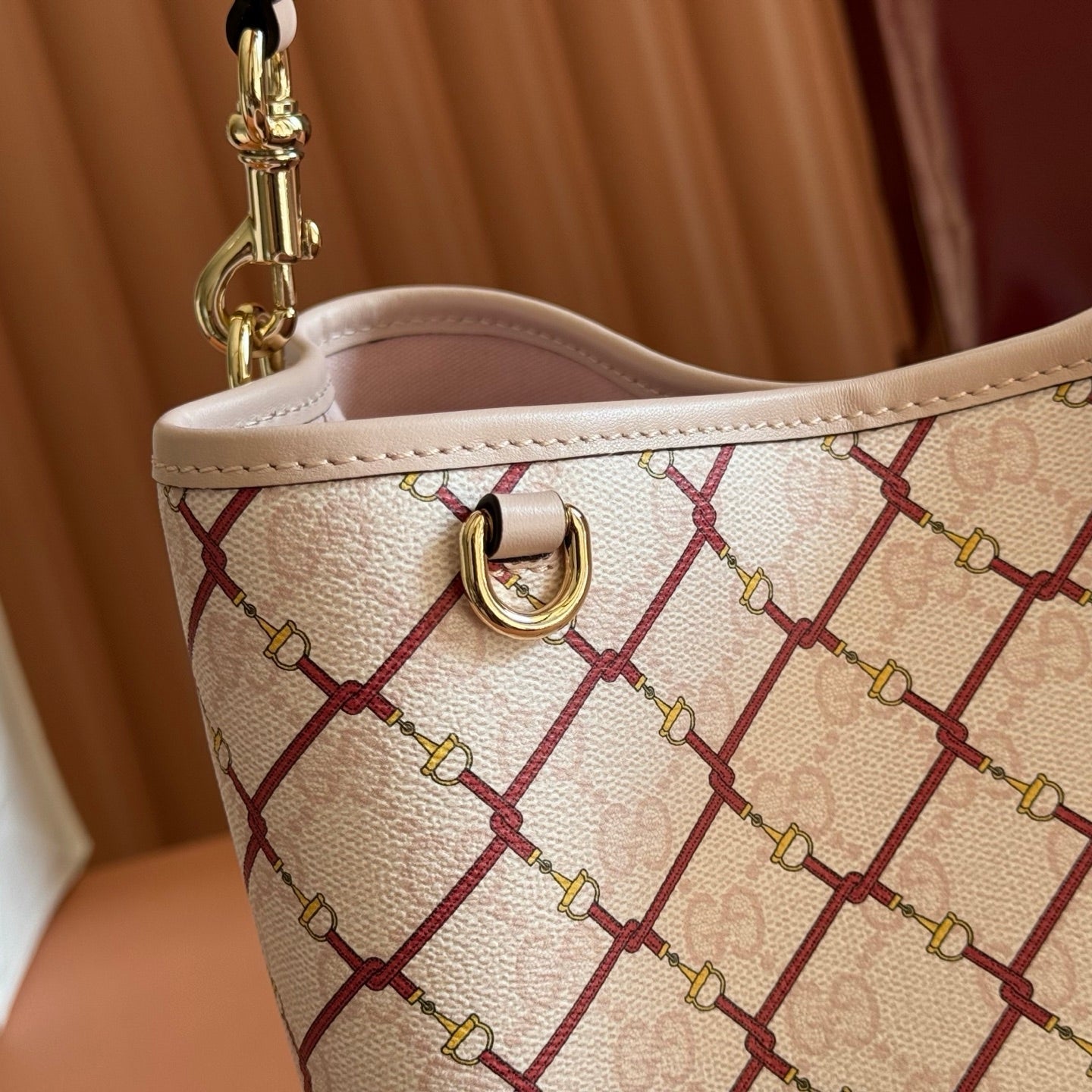 GUCCI 26S GG EMBLEM BUCKET BAG 25 IN LIGHT PINK COATED FABRIC