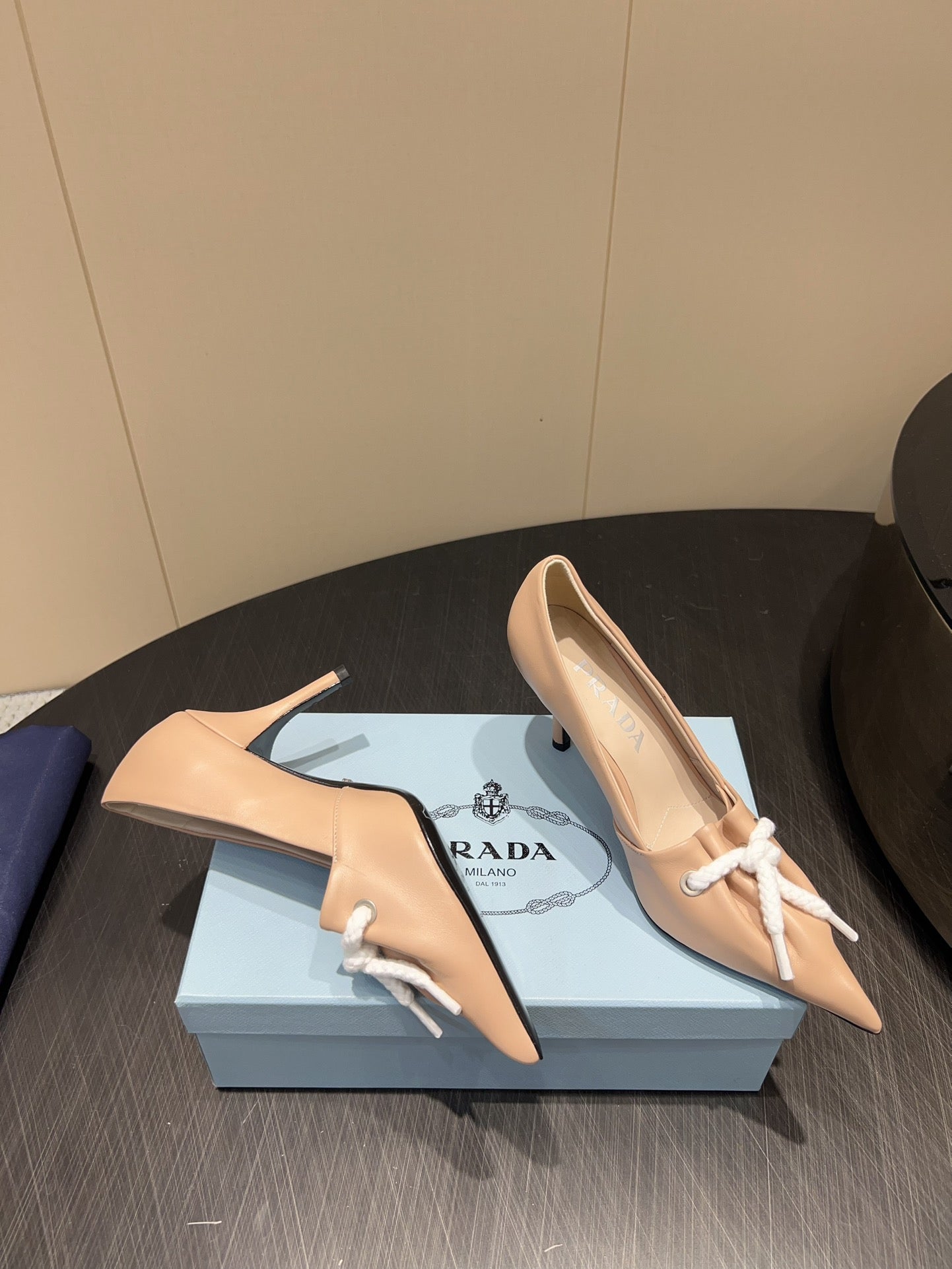PRADA 25S POINTED TOE HIGH HEELS 85MM IN BEIGE LAMBSKIN WITH TIE UP DESIGN - 35