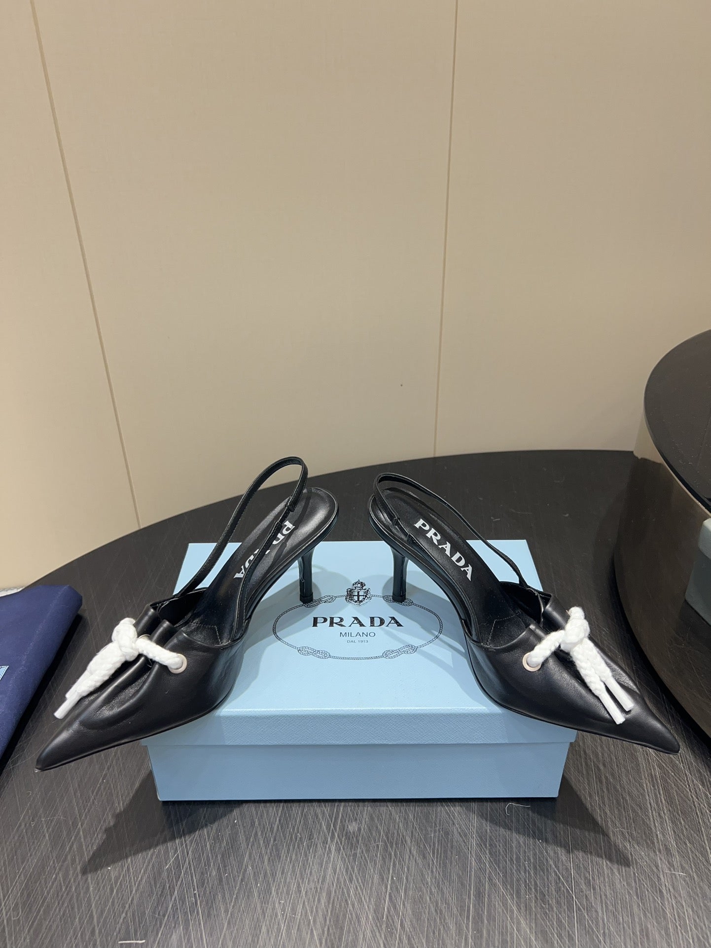 PRADA 25S POINTED TOE SLINGBACK 85MM IN BLACK LAMBSKIN WITH TIE UP DESIGN - 35