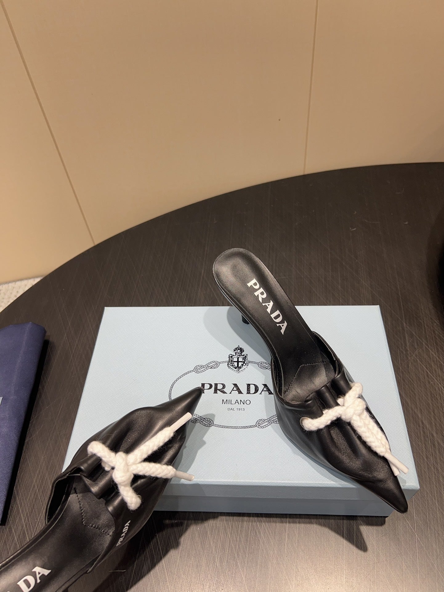 PRADA 25S BRAIDED DETAIL MULES 85MM IN BLACK CALFSKIN - 35