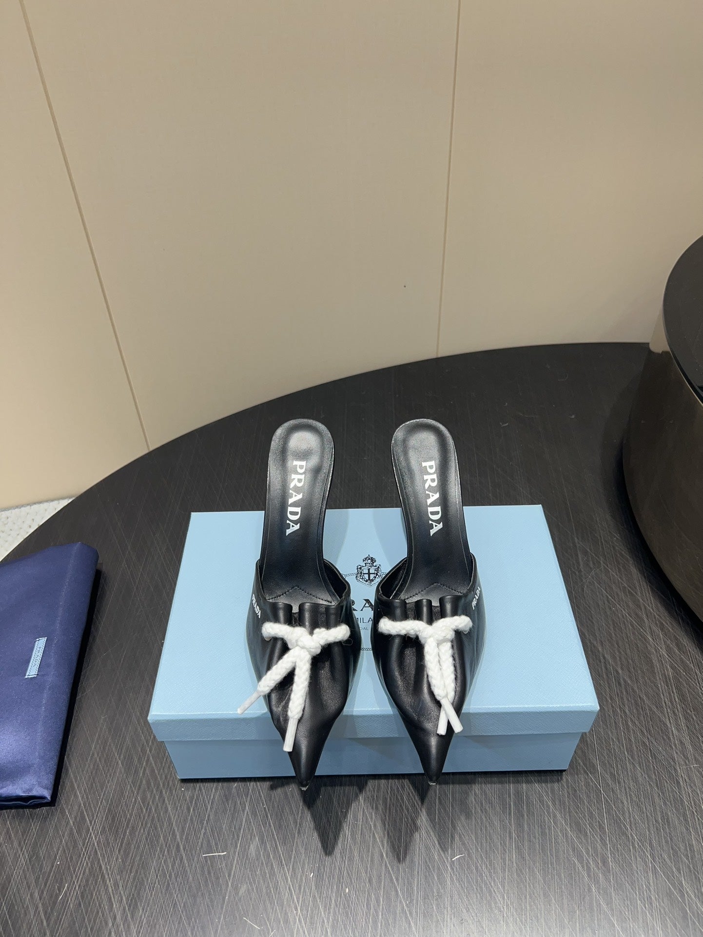PRADA 25S BRAIDED DETAIL MULES 85MM IN BLACK CALFSKIN - 35