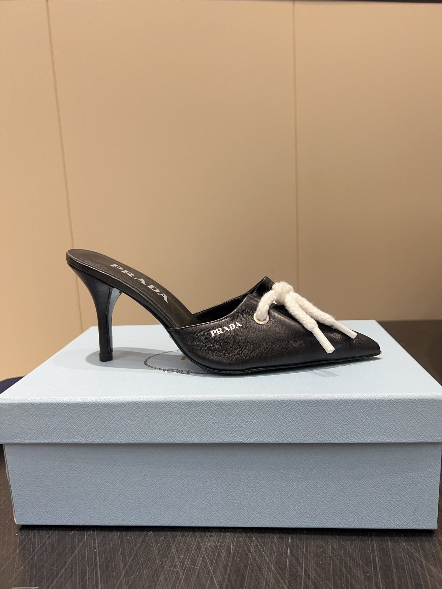 PRADA 25S BRAIDED DETAIL MULES 85MM IN BLACK CALFSKIN - 35