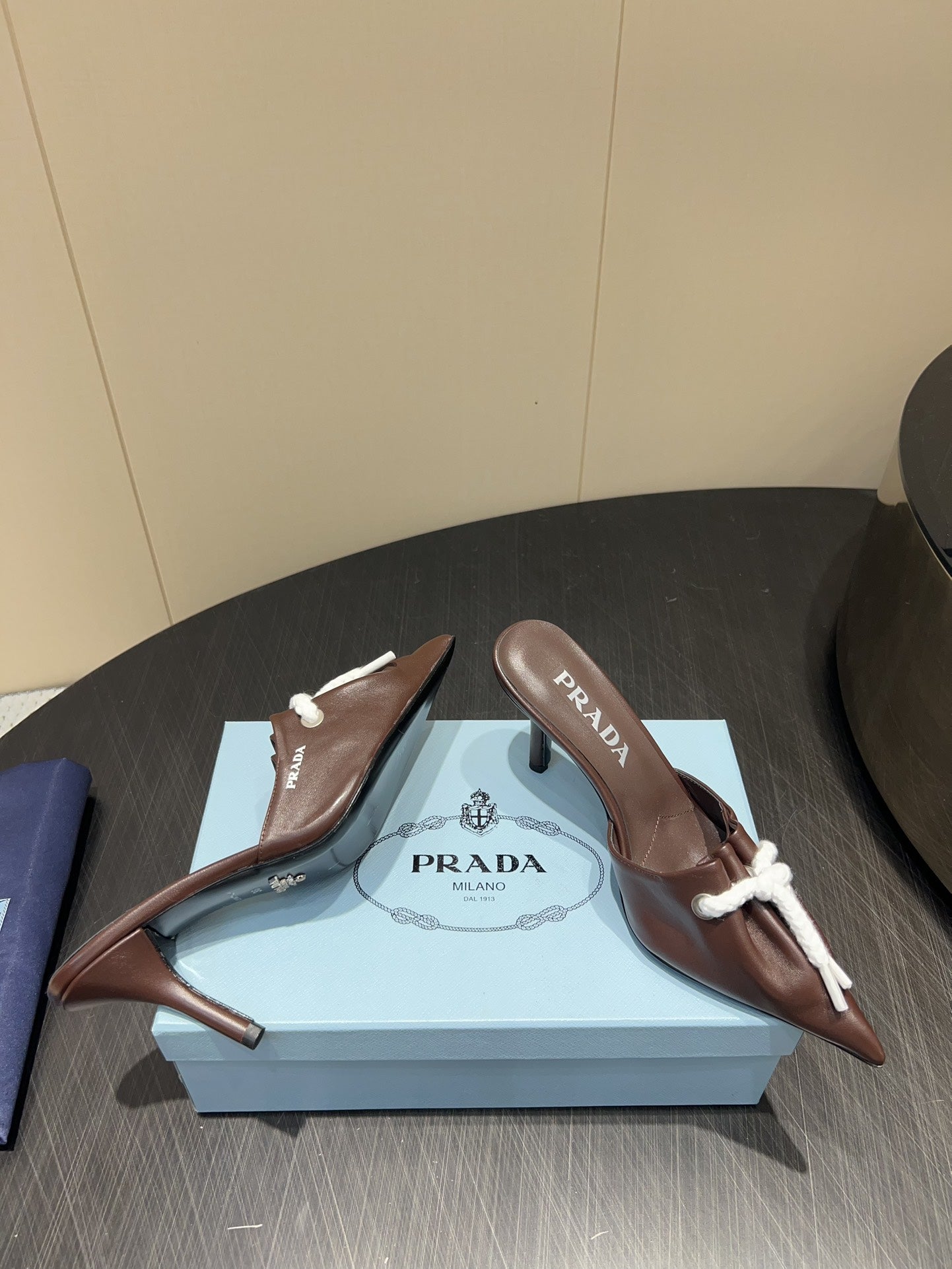 PRADA 25S BRAIDED DETAIL MULES 85MM IN DARK BROWN CALFSKIN - 35