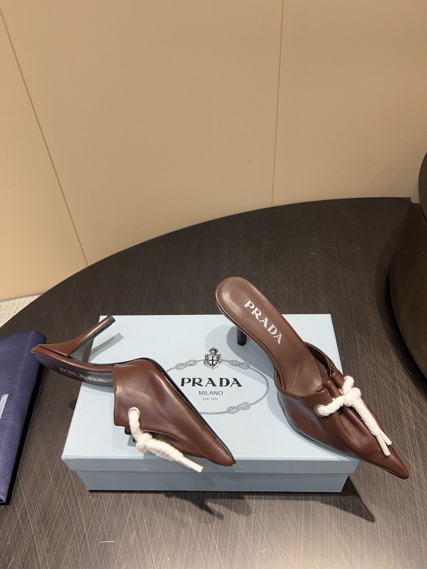 PRADA 25S BRAIDED DETAIL MULES 85MM IN DARK BROWN CALFSKIN - 35