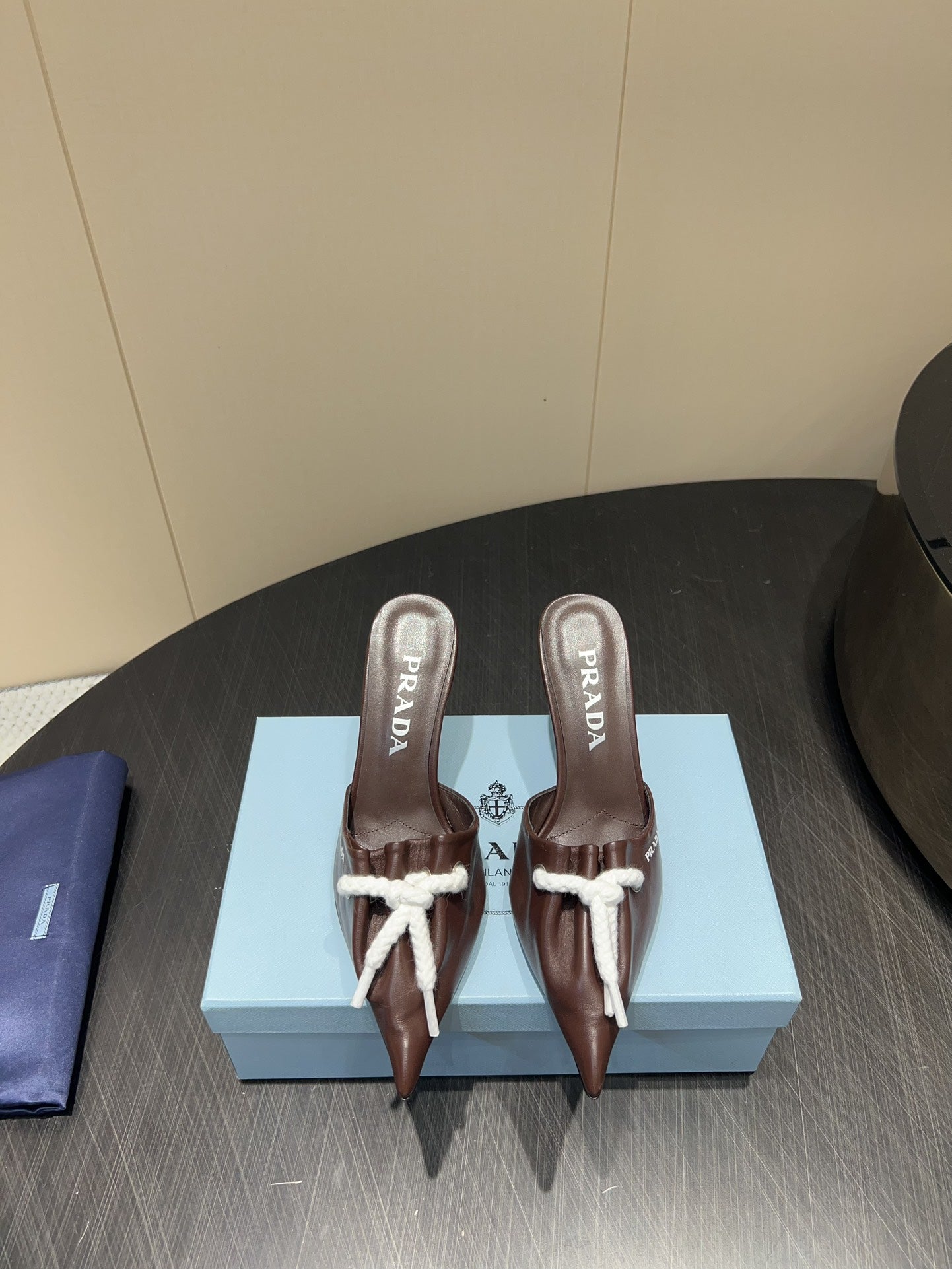 PRADA 25S BRAIDED DETAIL MULES 85MM IN DARK BROWN CALFSKIN - 35