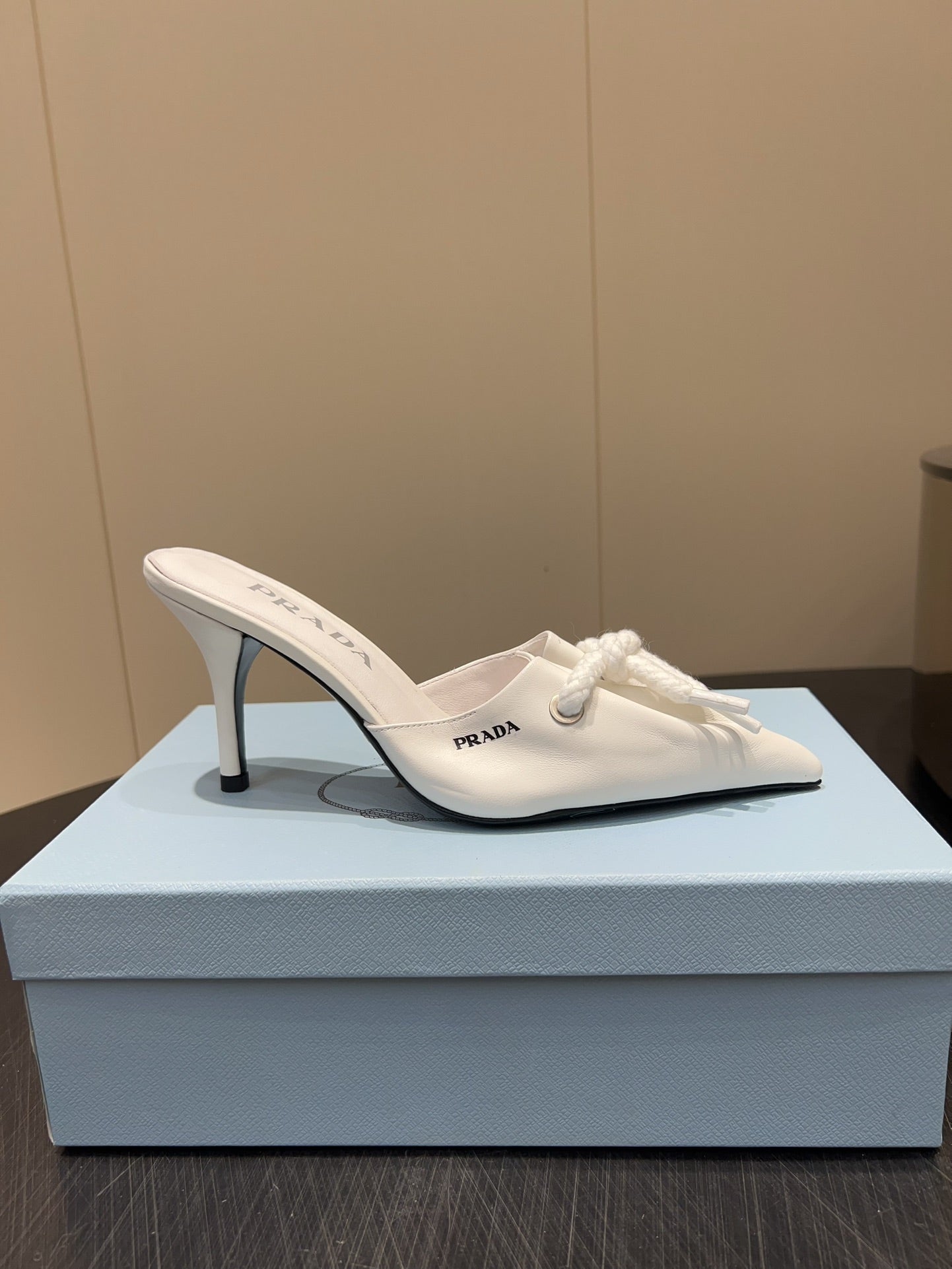 PRADA 25S BRAIDED DETAIL MULES 85MM IN WHITE CALFSKIN - 35