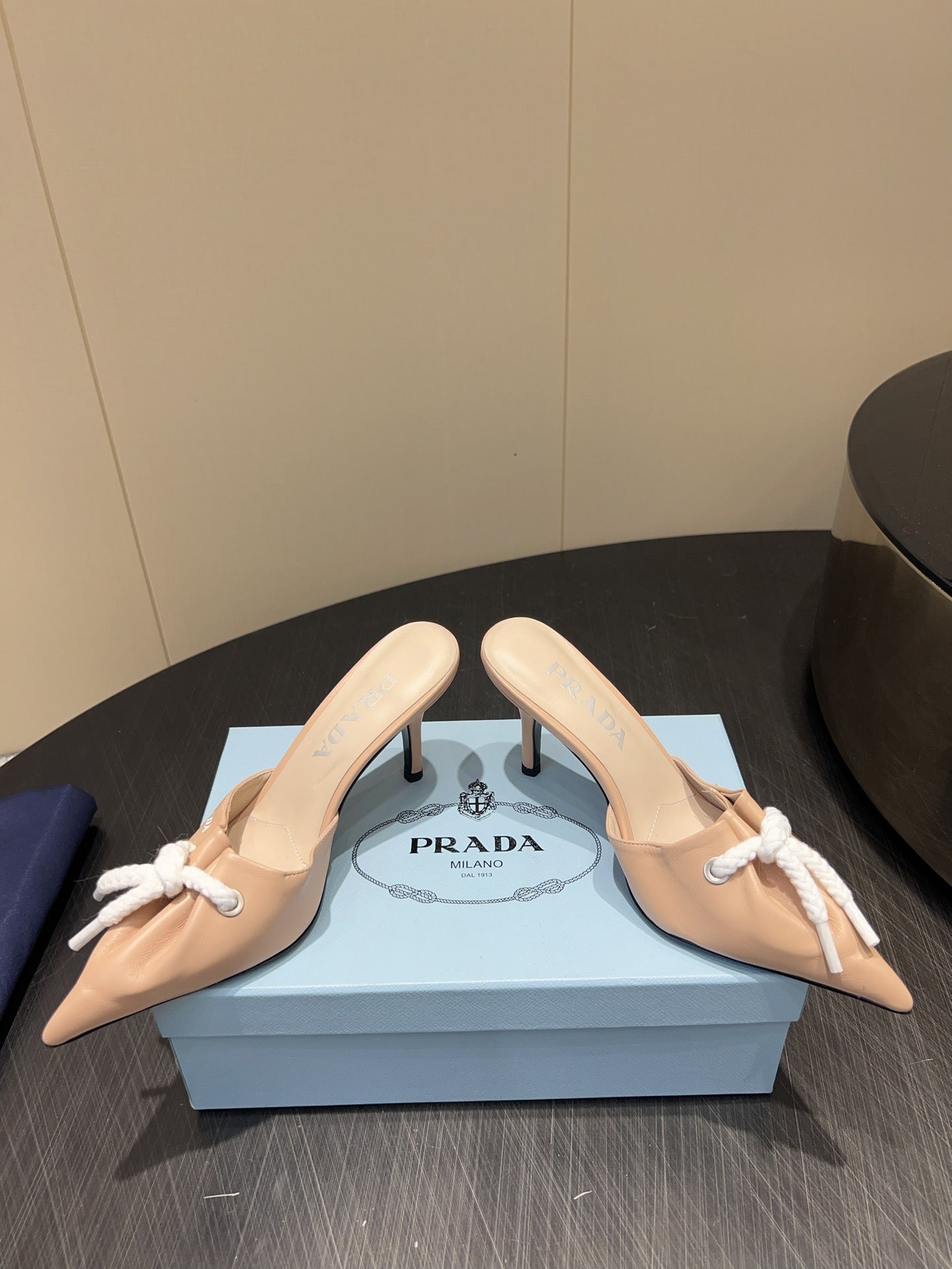 PRADA 25S BRAIDED DETAIL MULES 85MM IN BEIGE CALFSKIN - 35