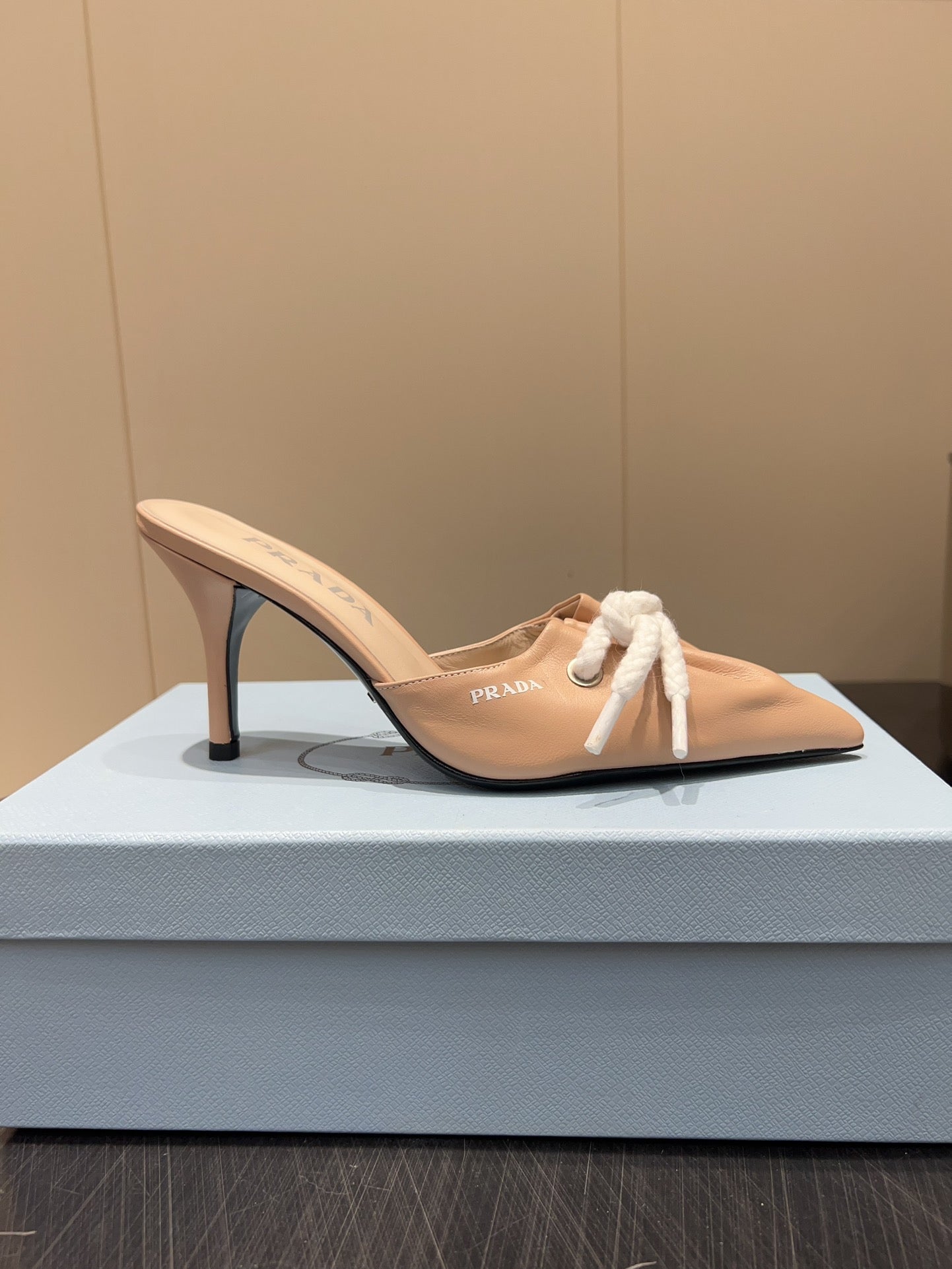 PRADA 25S BRAIDED DETAIL MULES 85MM IN BEIGE CALFSKIN - 35