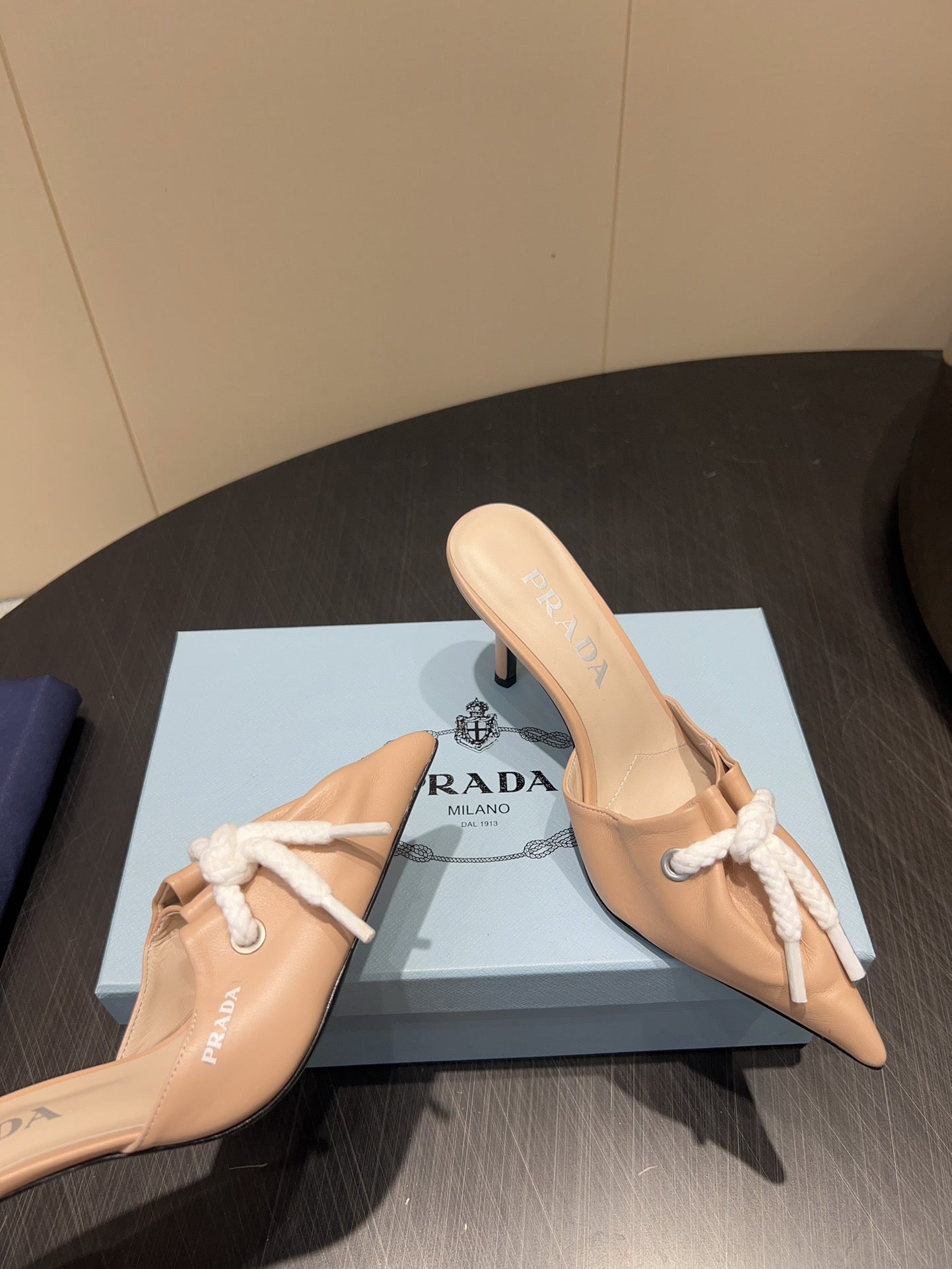PRADA 25S BRAIDED DETAIL MULES 85MM IN BEIGE CALFSKIN - 35