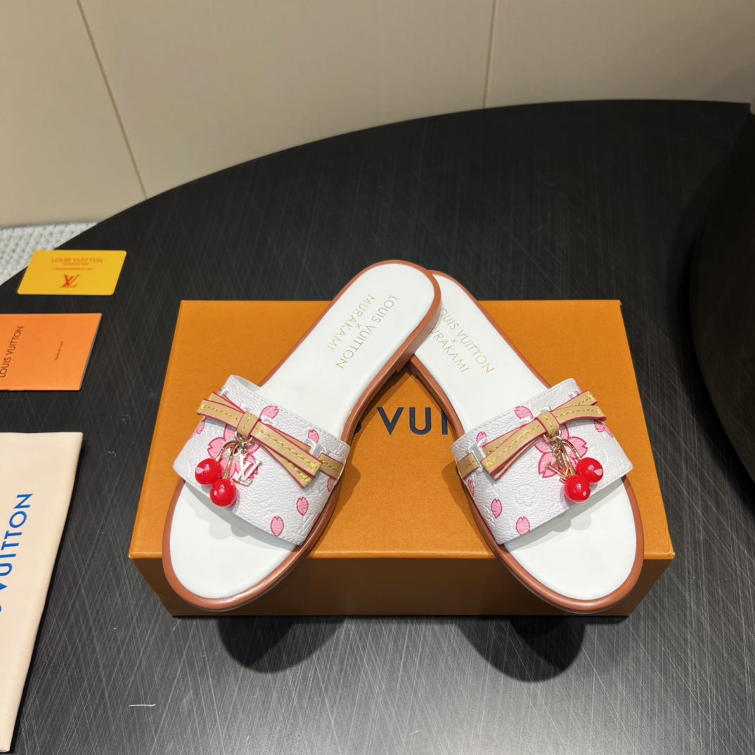 LV SLIDE SANDALS 25S IN WHITE CALFSKIN WITH CHERRY BLOSSOM BUCKLE - 35
