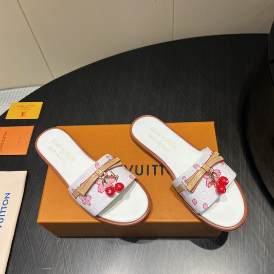 LV SLIDE SANDALS 25S IN WHITE CALFSKIN WITH CHERRY BLOSSOM BUCKLE - 35