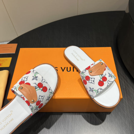 ШЛЬОПАНЦІ LV SLIDE 25S З БІЛОГО ДЕНІМУ ТА ТЕЛЯЧОЇ ШКІРИ З НАДРУКОМ ЛОГОТИПУ — 35