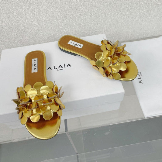 ALAIA FLAT MULE IN GOLDEN GLOSSY LAMBSKIN - 34