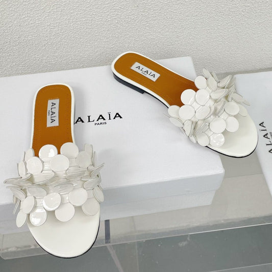 ALAIA FLAT MULE IN WHITE GLOSSY LAMBSKIN - 34