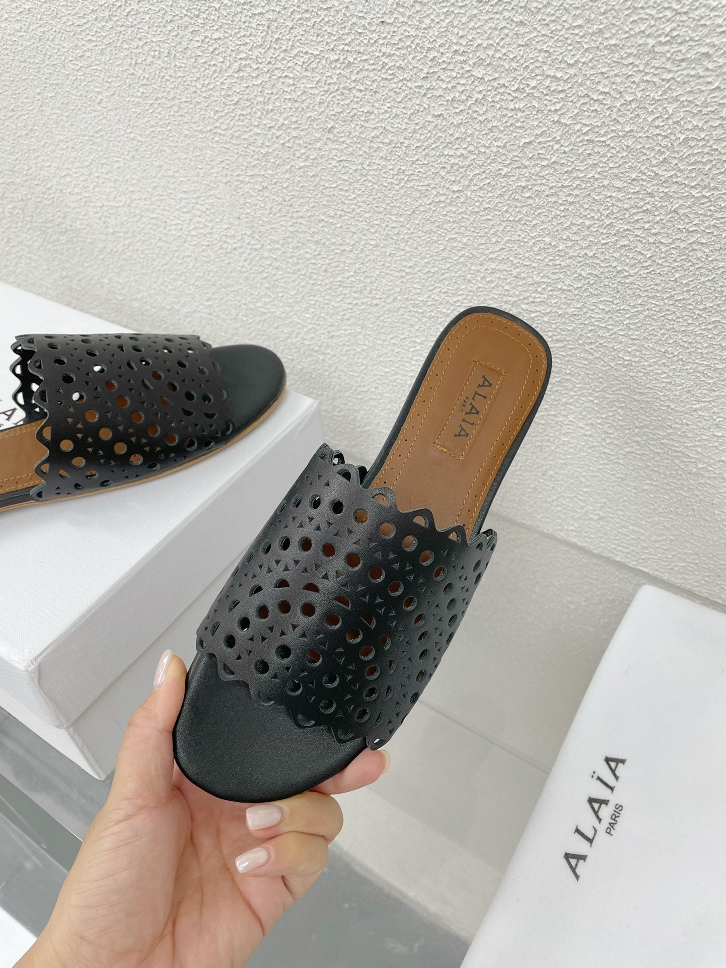 ALAIA VIENNE FLAT MULES IN BLACK LAMBSKIN - 34