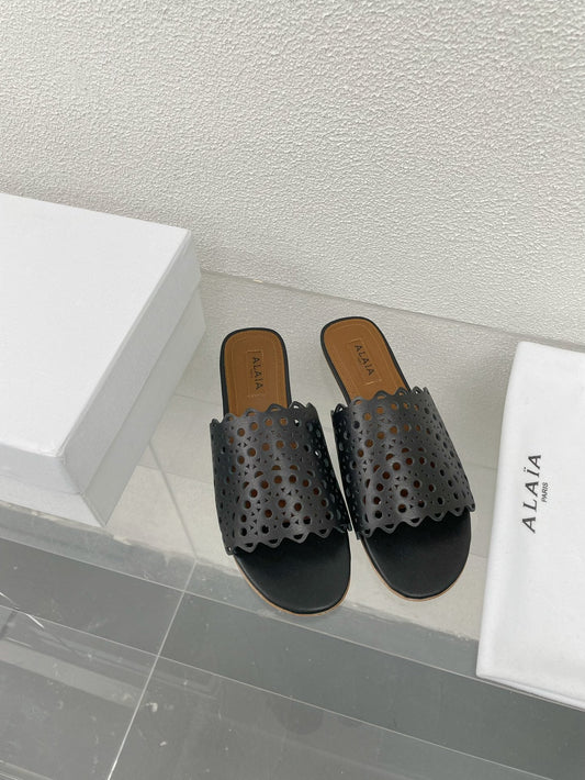 ALAIA VIENNE FLAT MULES IN BLACK LAMBSKIN - 34