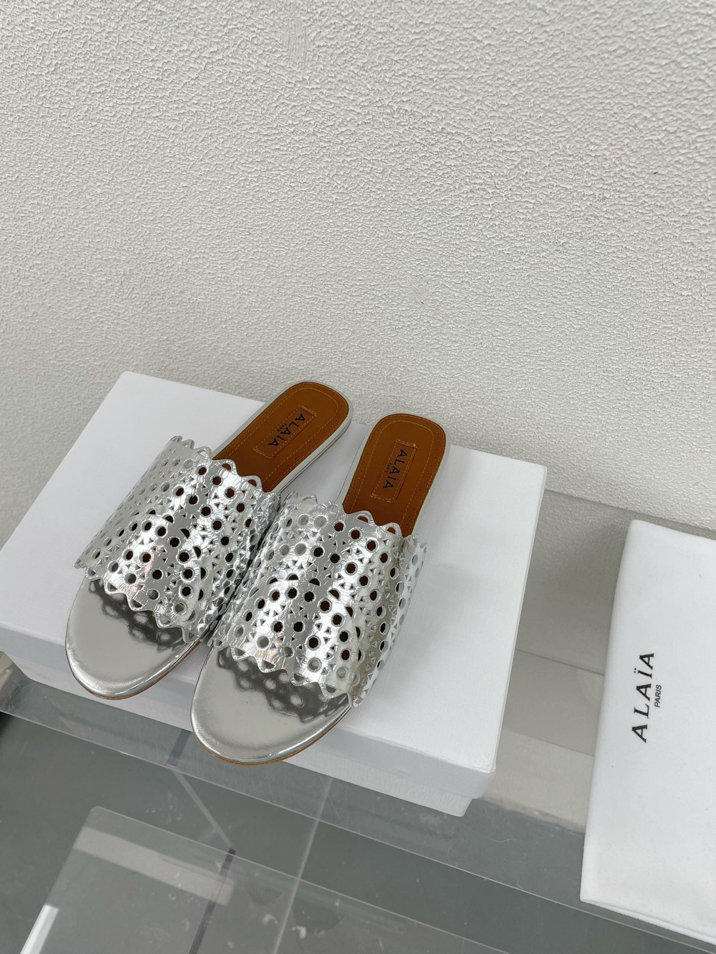 ALAIA VIENNE FLAT MULES IN SILVER LAMBSKIN - 34