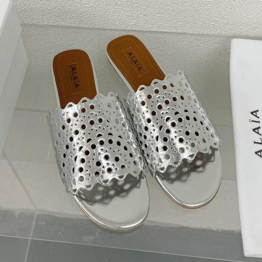 ALAIA VIENNE FLAT MULES IN SILVER LAMBSKIN - 34