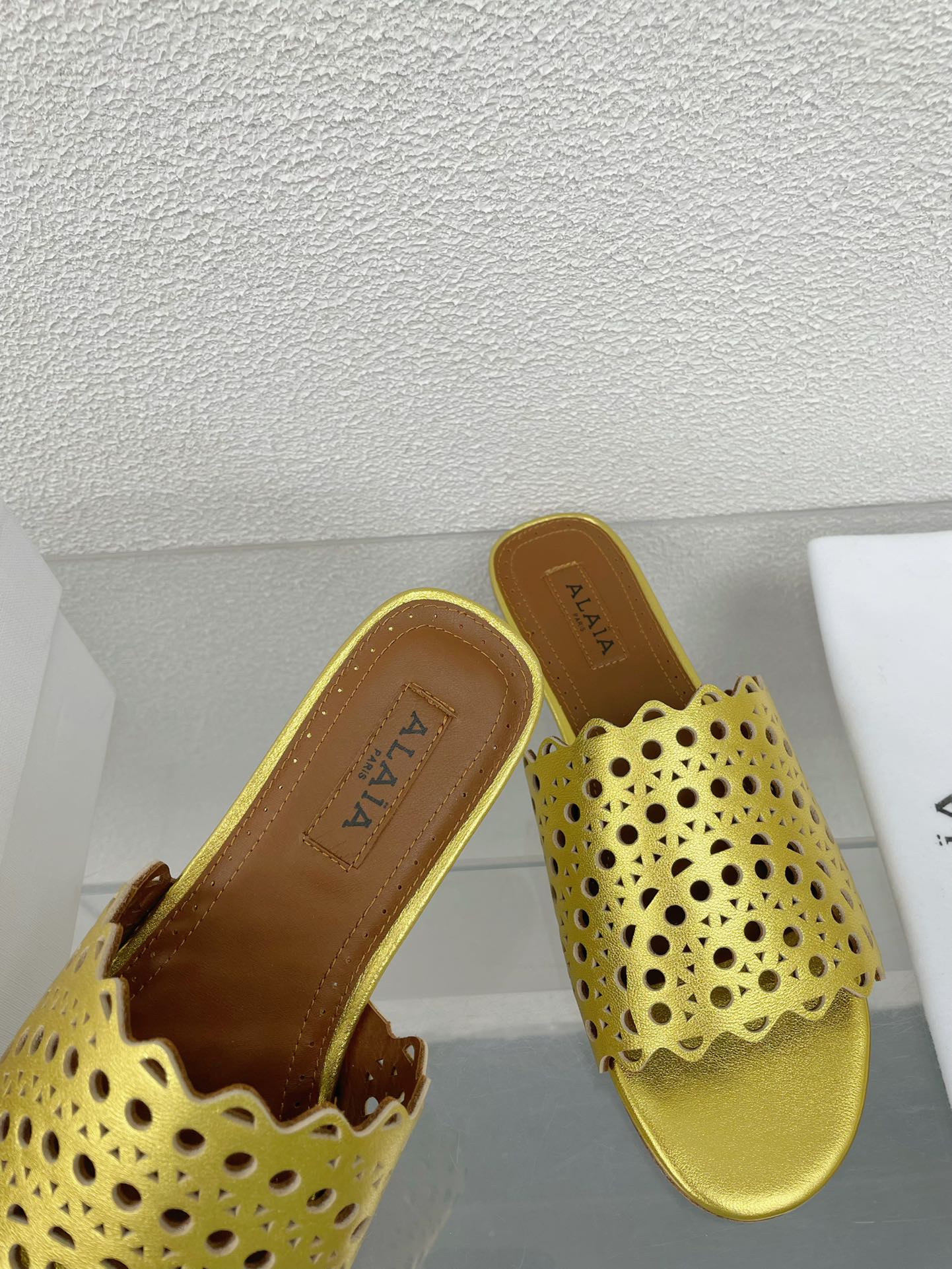 ALAIA VIENNE FLAT MULES IN GOLDEN LAMBSKIN - 34