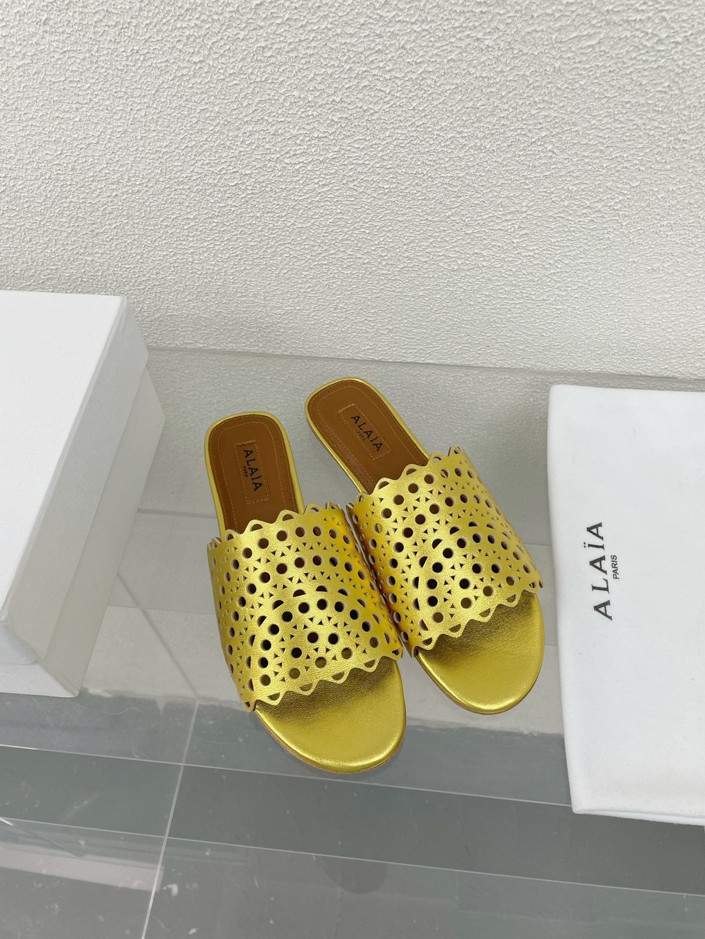 ALAIA VIENNE FLAT MULES IN GOLDEN LAMBSKIN - 34