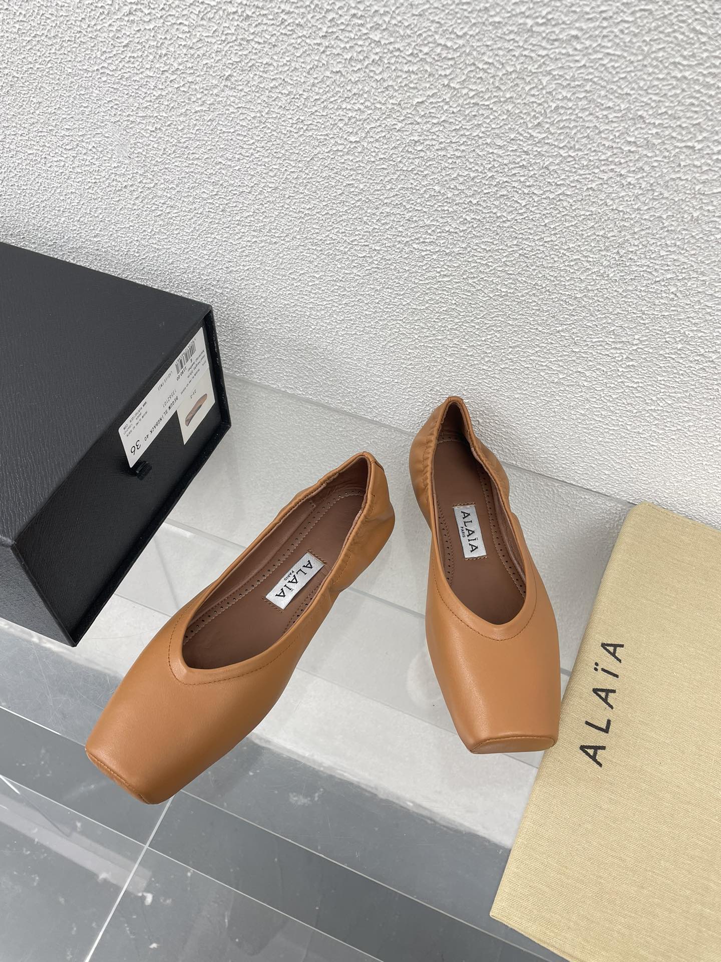 ALAIA BALLET FLATS IN COPPER BROWN CALFSKIN - 34