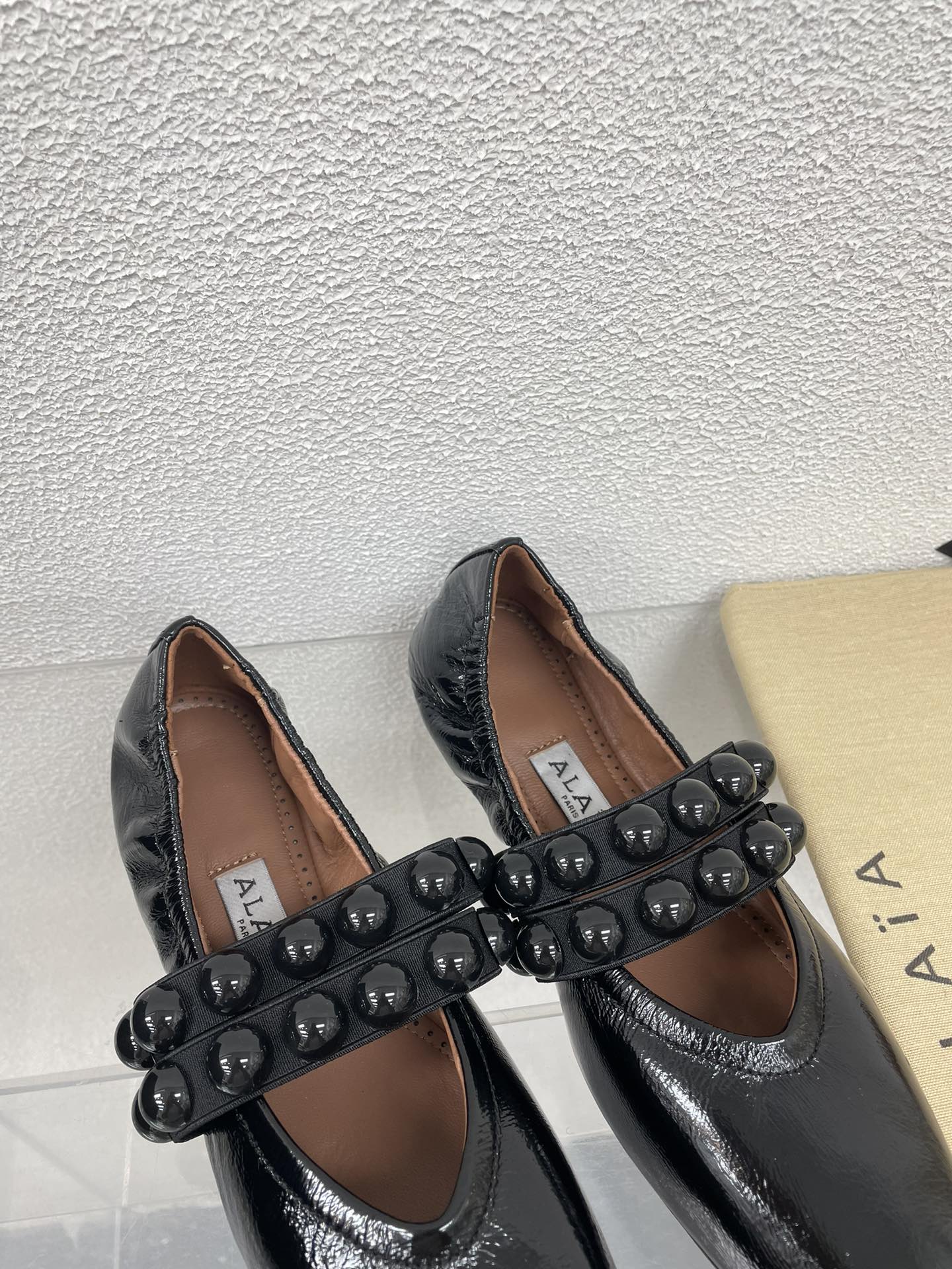 ALAIA MARY JANE PEARL IN GLOSSY BLACK LAMBSKIN - 34