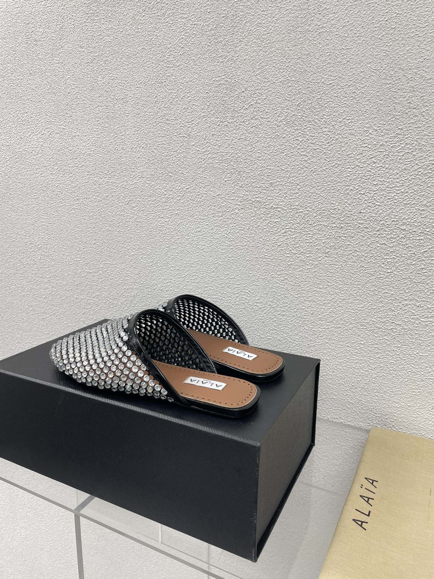 ALAIA FLAT MULES IN STRASS BLACK LAMBSKIN WITH RHINSTONES - 34