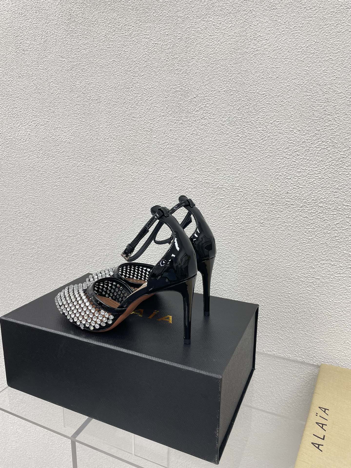 ALAIA HIGH FISHNET PUMPS IN BLACK MESH WITH WHITE RHINSTONES - 35