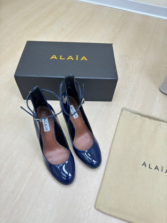 DECOLLETE PUMPS IN NAVY BLUE PATENT CALFSKIN - 34