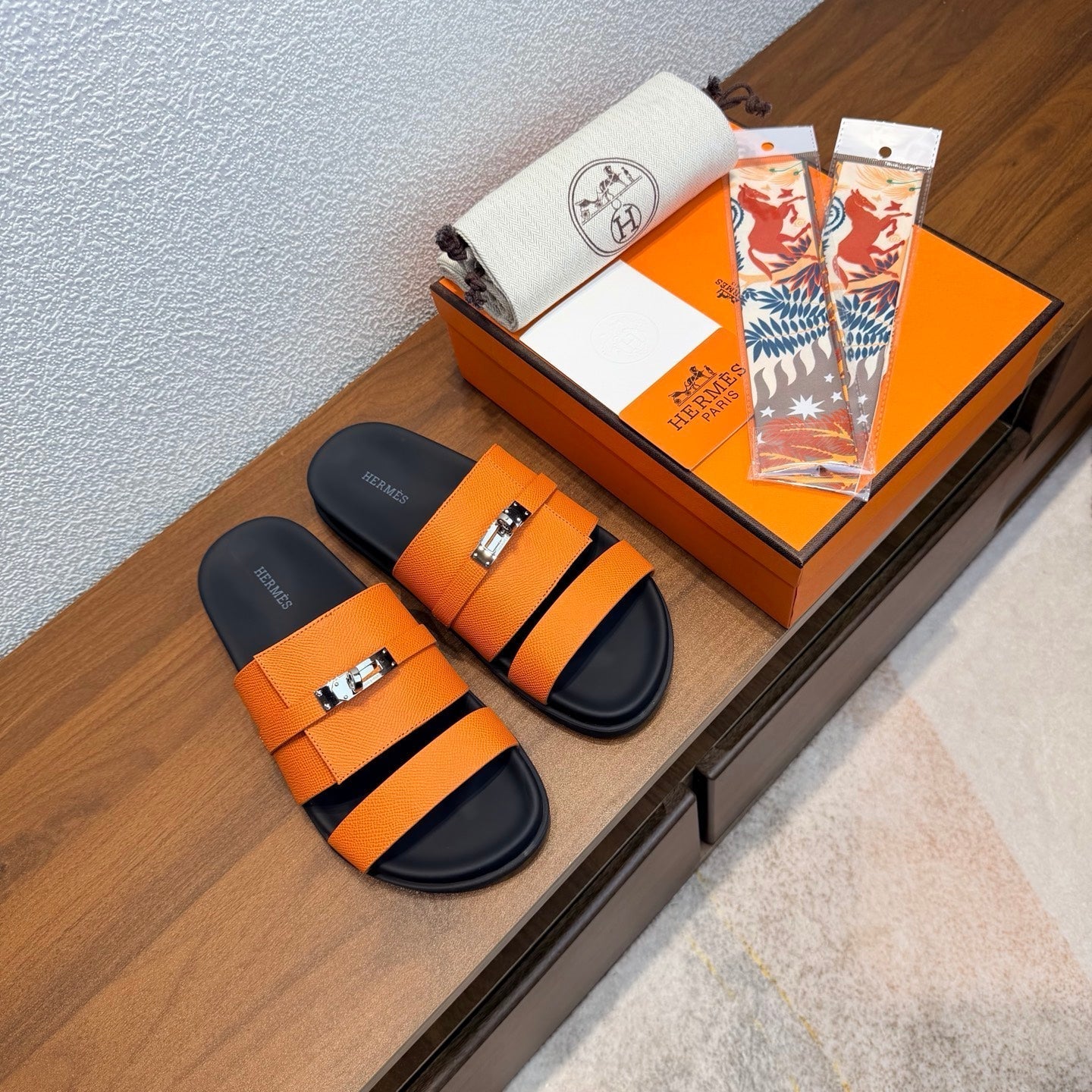 HM 26S KELLY BUCKLE DOUBLE STRAP SANDALS IN ORANGE CALFSKIN