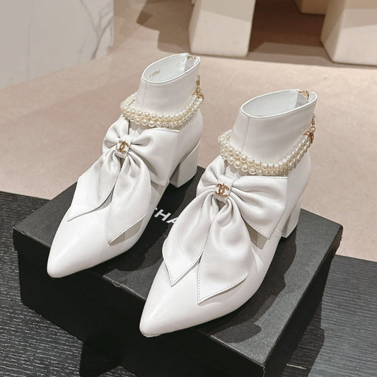 SHORT BOOTS IN WHITE SHEEPSKIN WITH BOW - 35