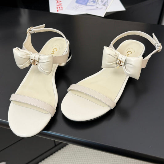 FLAT SANDALS IN WHITE CALFSKIN WITH BOW - 34