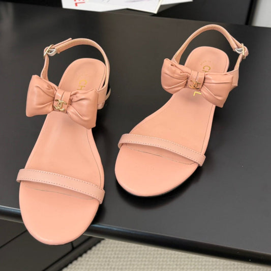 FLAT SANDALS IN PEACHY PINK CALFSKIN WITH BOW - 34