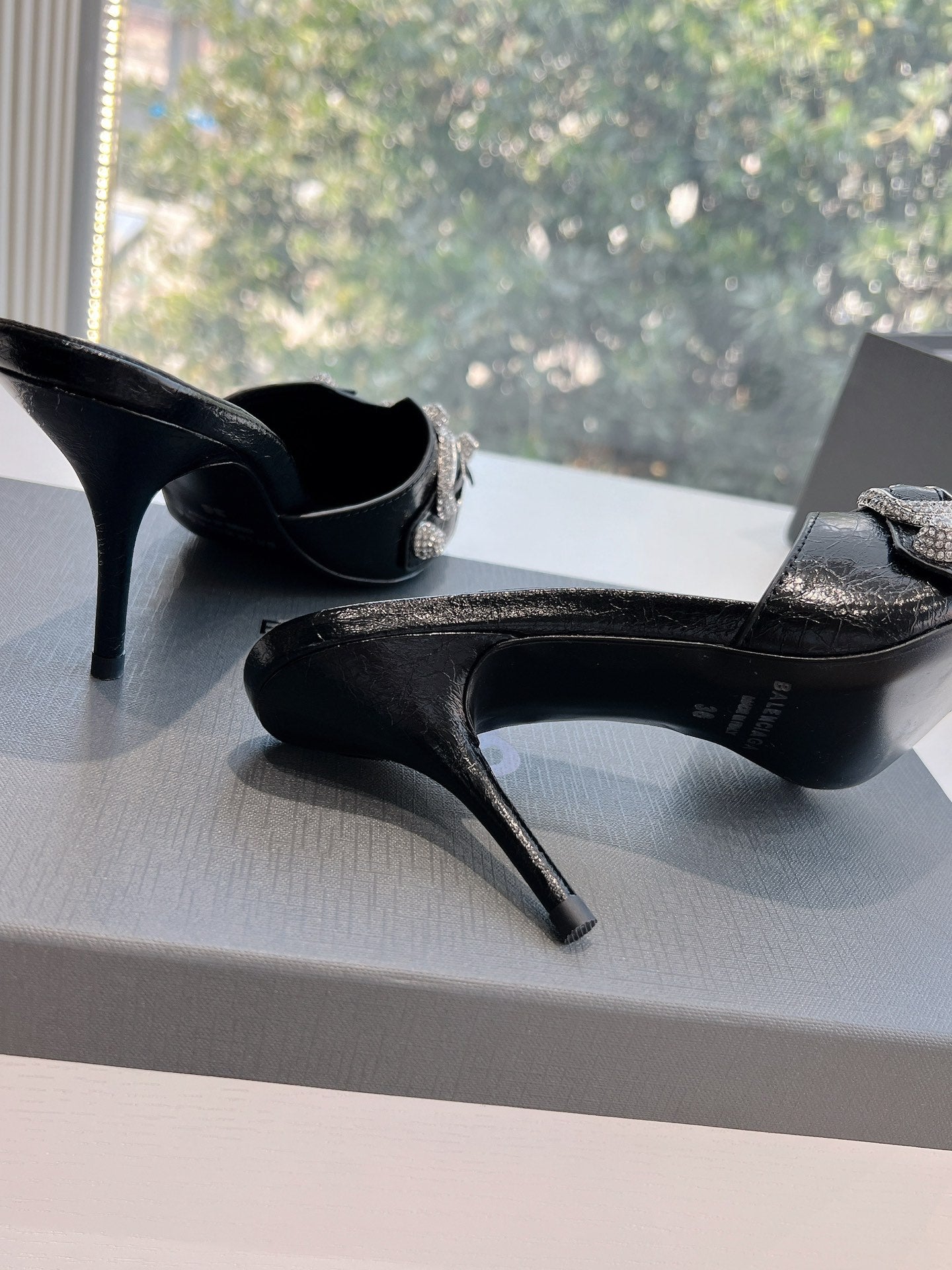 CRYSTAL BUCKLE BLACK WAX-OIL SHEEPSKIN HEELED MULES - 34