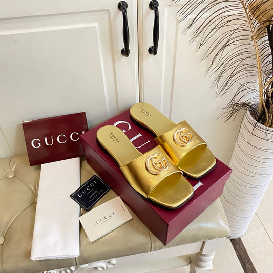 ШЛЬОПАНЦІ GUCCI 26S ІЗ ЗОЛОТОЇ ТЕЛЯЧОЇ ШКІРИ