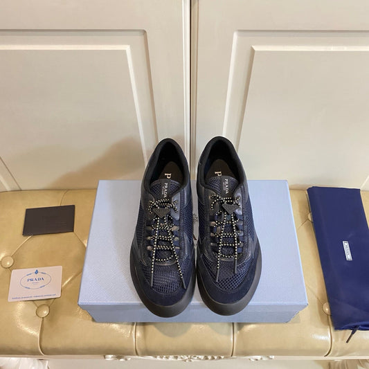 Кросівки PRADA 26S на шнурівці з масивною підошвою з синьої технічної тканини та сітки