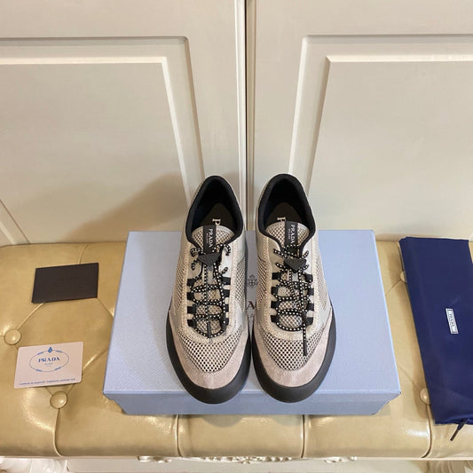 КРОСІВКИ PRADA 26S НА ШНУРІВЦІ НА МАСИВНІЙ ПІДОШВІ З СІРОЇ ТЕХНІЧНОЇ ТКАНИНИ ТА СІТКИ
