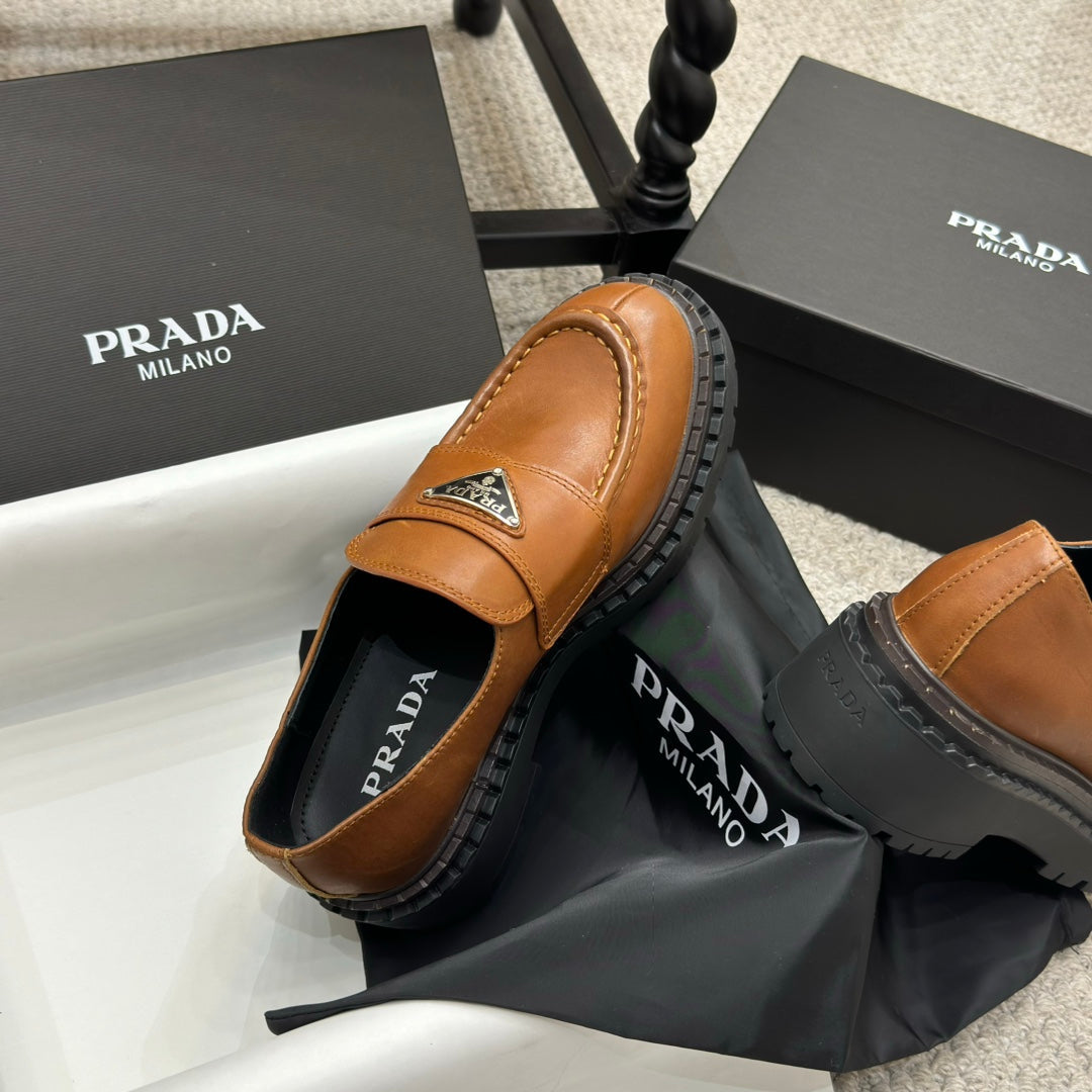 PRADA 25S LOAFER 50MM IN BURNT ORANGE CALFSKIN LOGO - 34