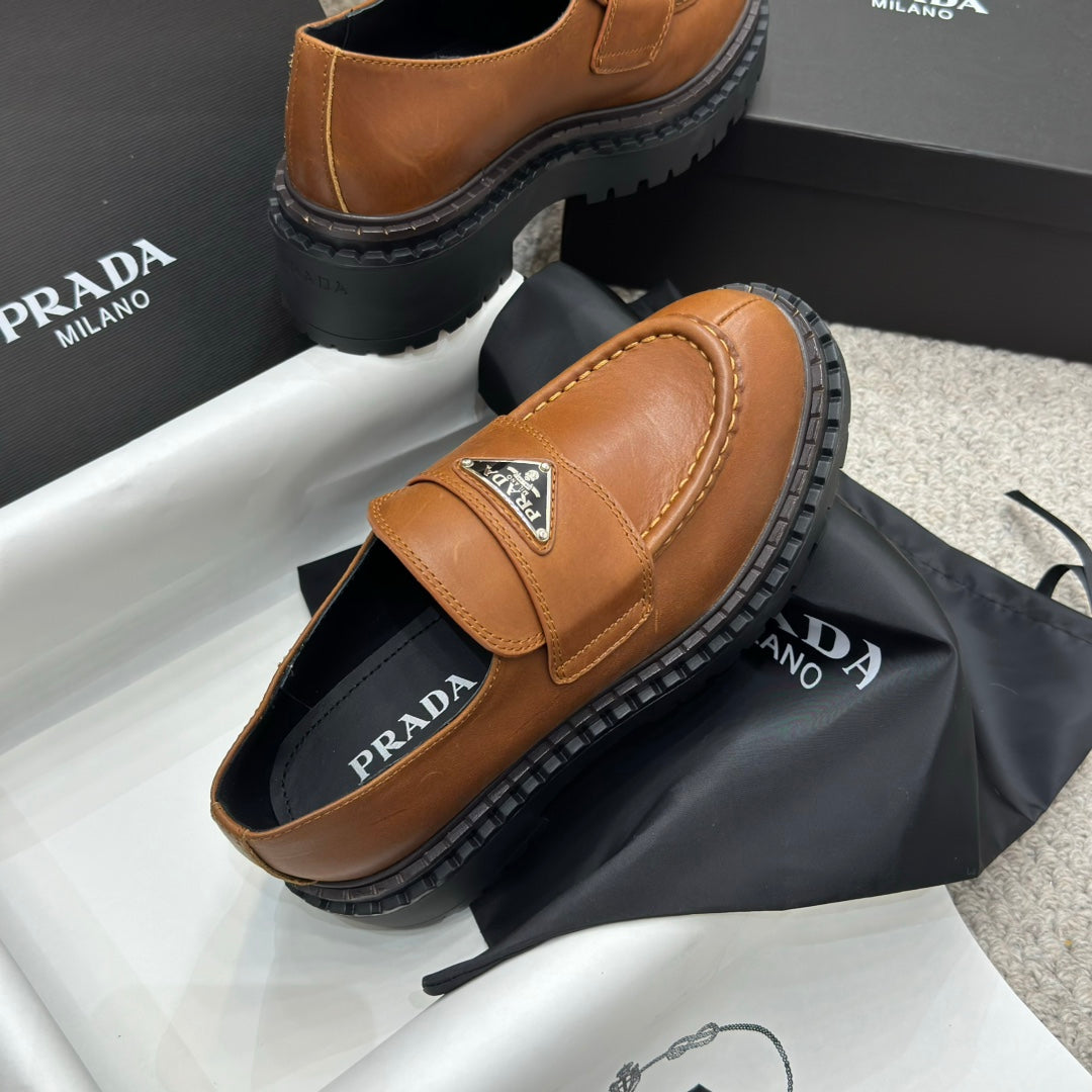 PRADA 25S LOAFER 50MM IN BURNT ORANGE CALFSKIN LOGO - 34