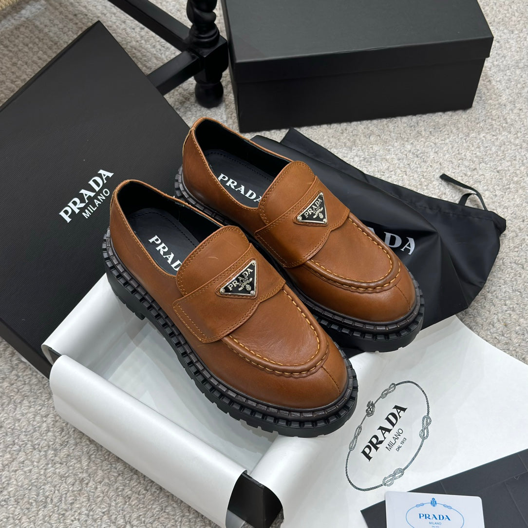 PRADA 25S LOAFER 50MM IN BURNT ORANGE CALFSKIN LOGO - 34