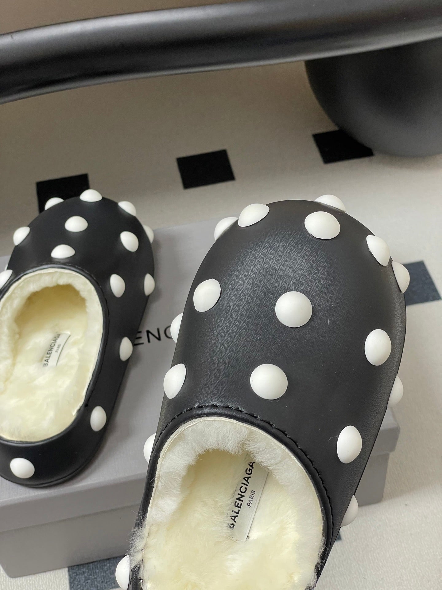 BALENCIAGA 25S FUR-LINED MULES IN BLACK AND WHITE FAUX LEATHER - 35