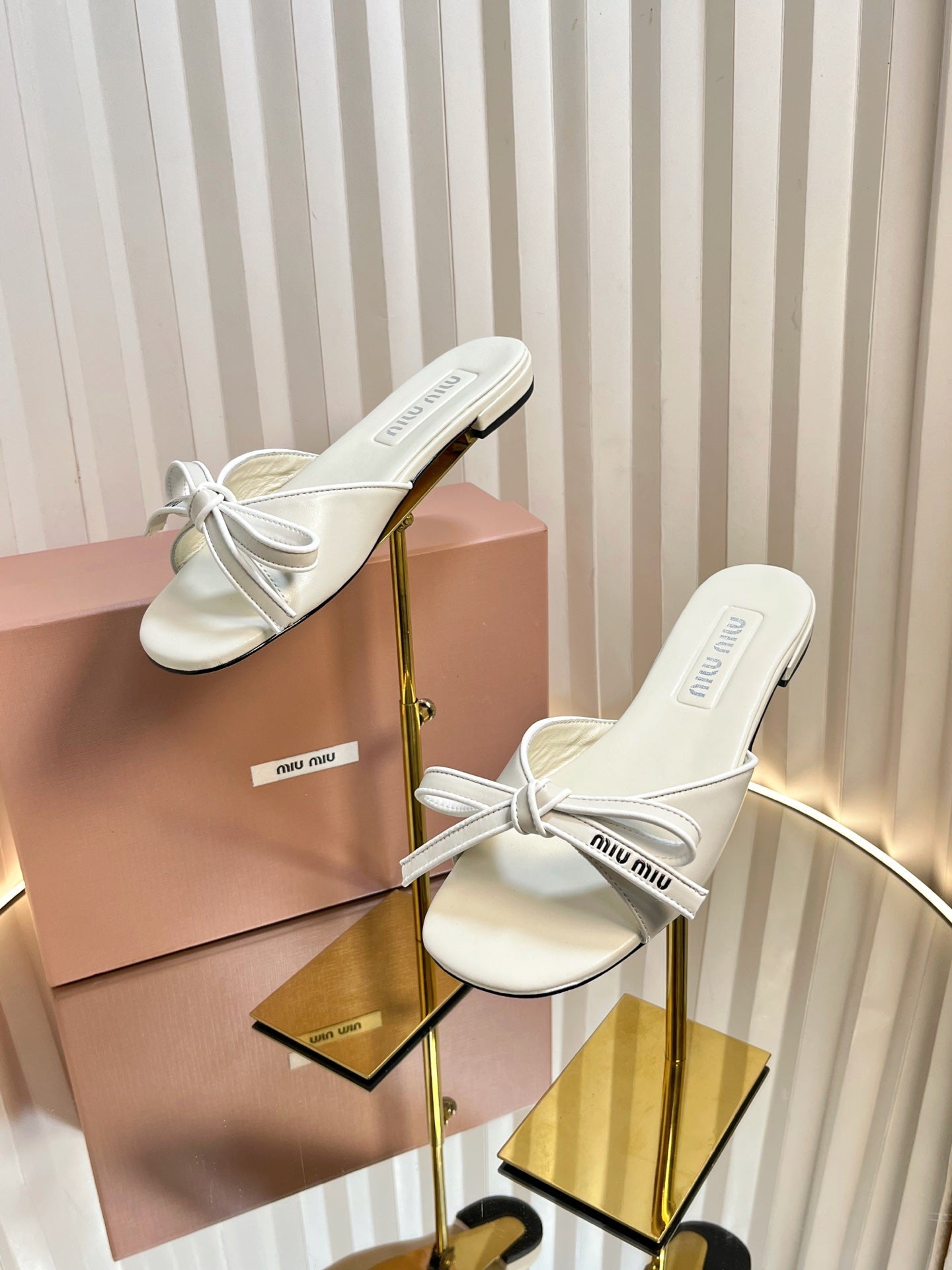 SLIDES SANDALS IN WHITE CALFSKIN BOW IN TRAP - 34